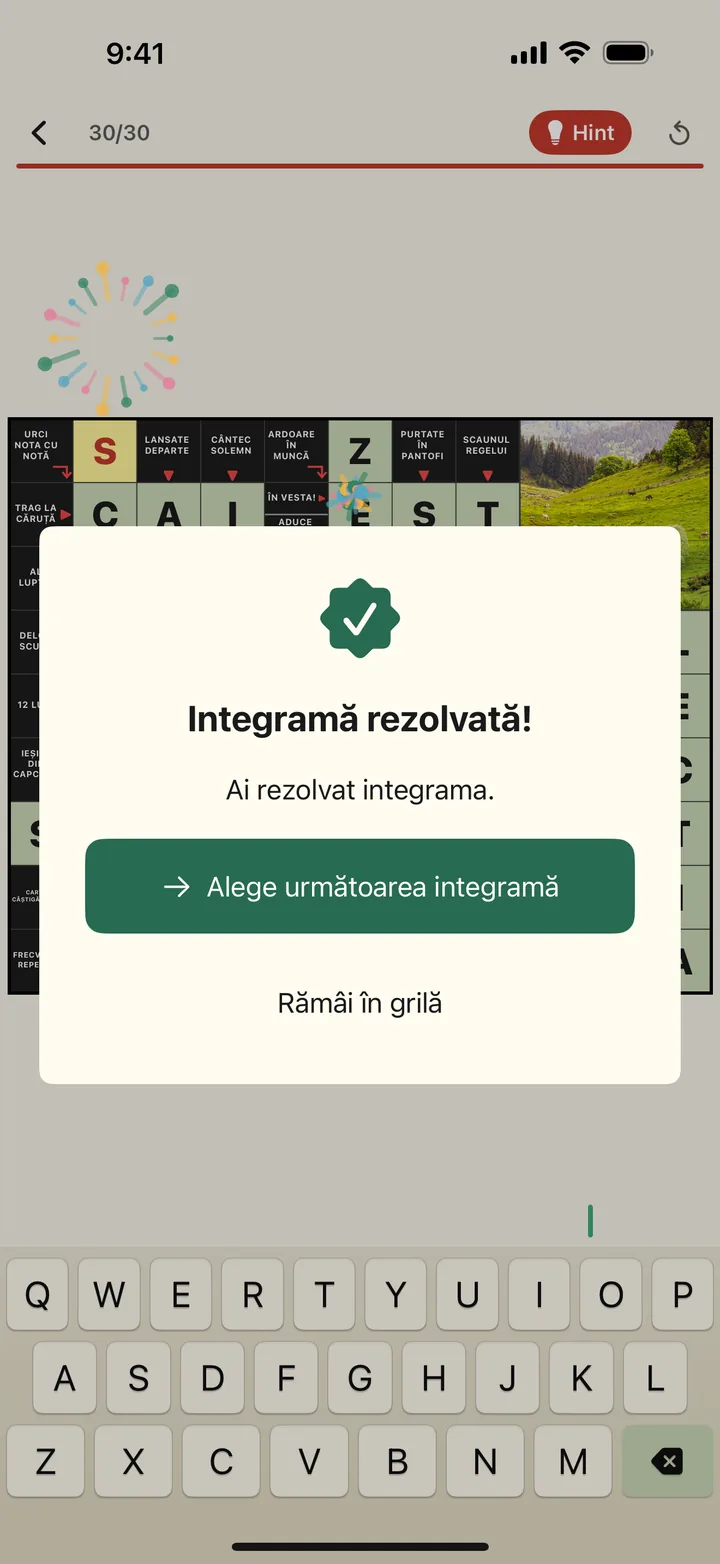 Ecranul de integramă rezolvată, cu artificii și butonul către următoarea grilă